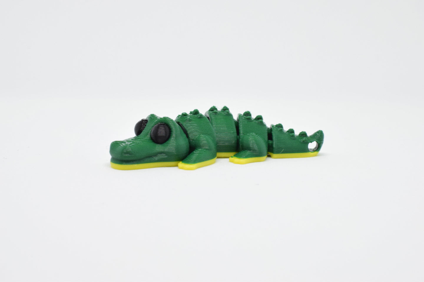 Flexi krokodil, witte achtergrond